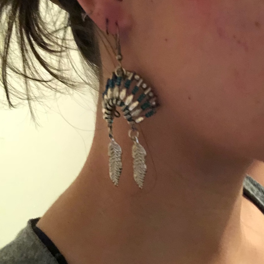 Pair of headdress inspired earrings